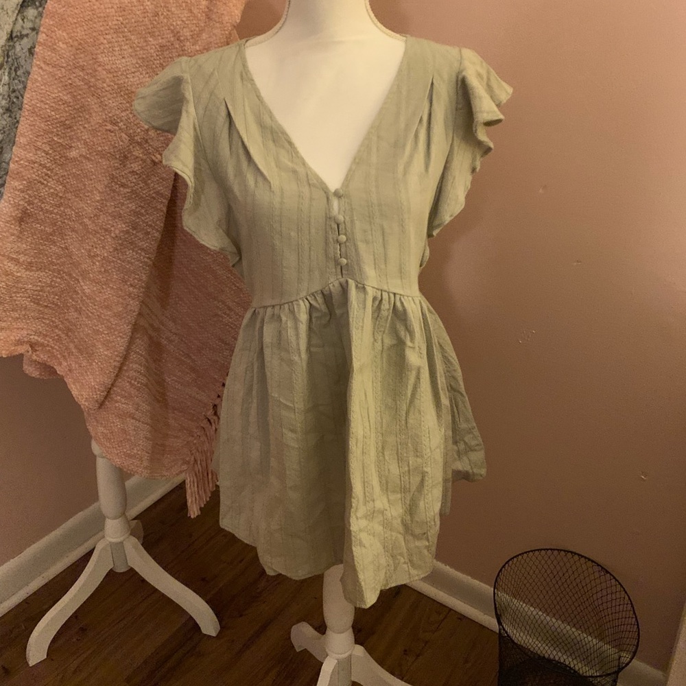 Listicle peplum top with ruffle sleeve